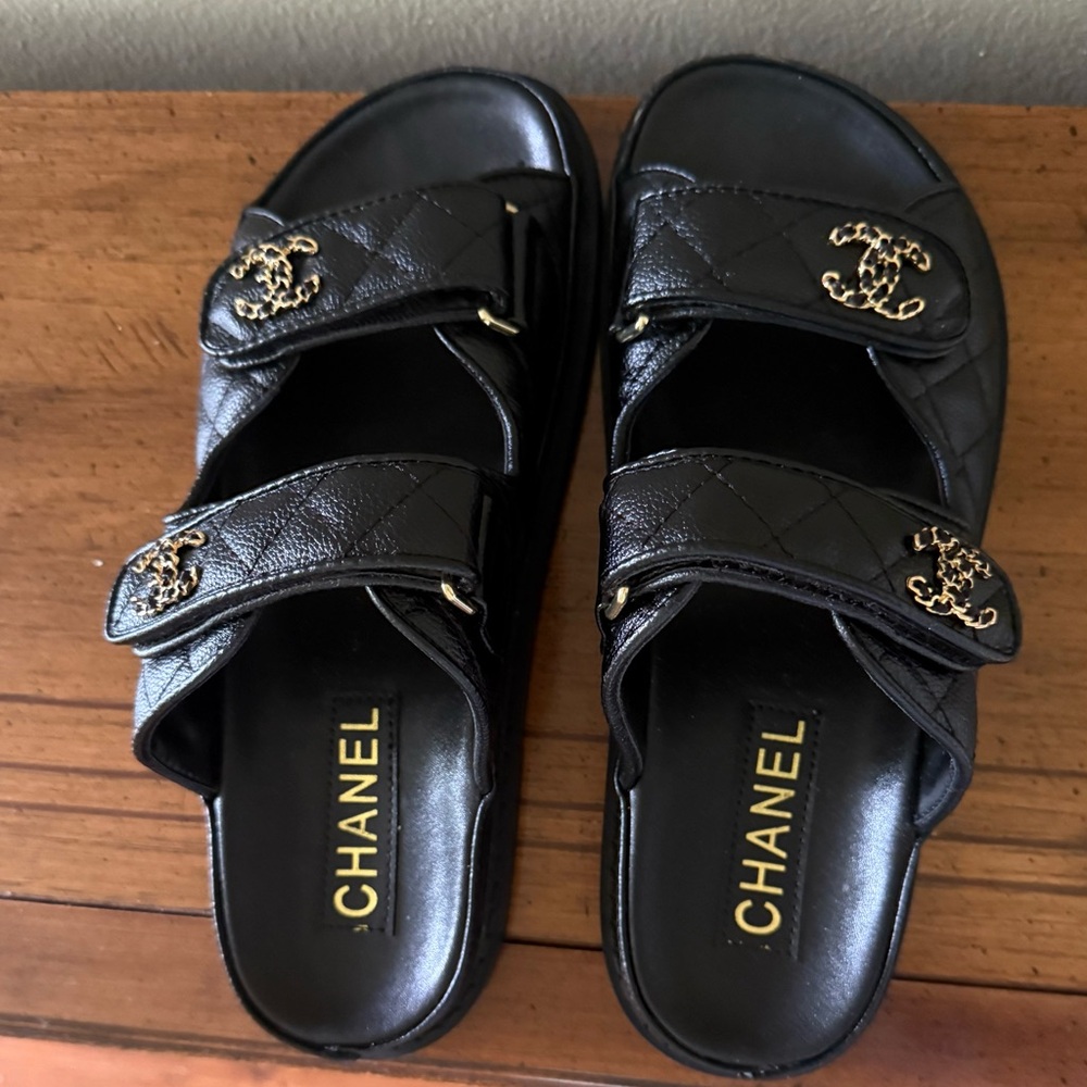 CHANEL Black Quilted Slide Sandals with Gold Logo